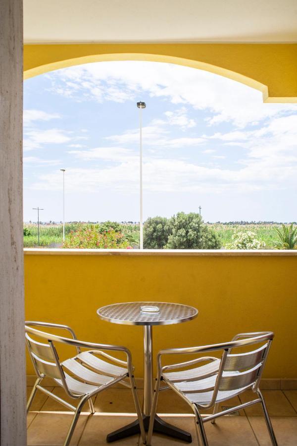 Hôtel Il Fenicottero à Quartu SantʼElena Extérieur photo